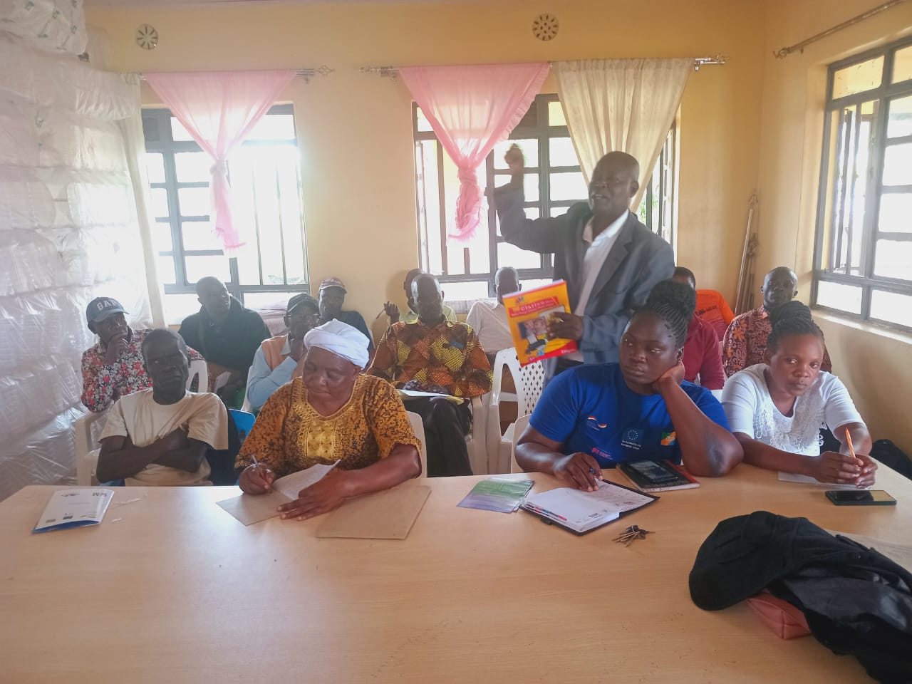 Hands holding rich, dark compost soil